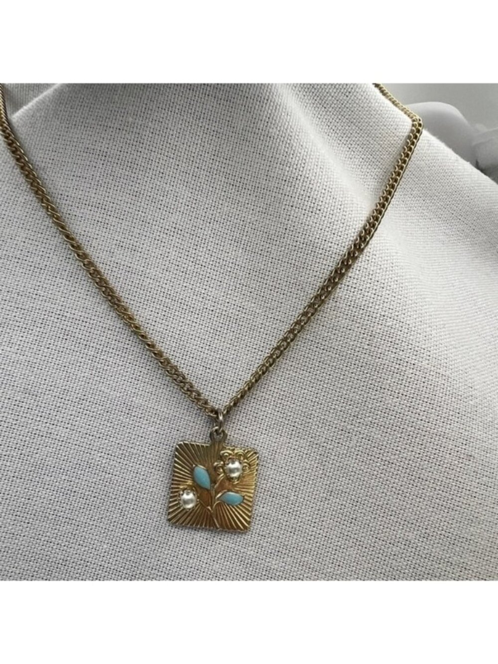 EMJ gold tone enamel and faux pearl flower pendant